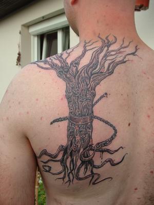 Photo de Arbre enchainé, tatouage, inclassable