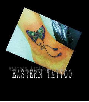 Photo de Papillon, papillon, fleurs réalisé par Eastern Tattoo