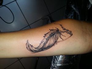 plume tattoo