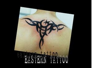 Photo de tribal, tribal, tatouage réalisé par Eastern Tattoo