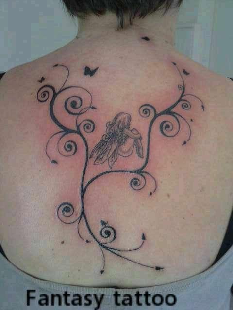 Photo de Arabesque, fée, tatouage réalisé par fantasy tattoo piercing