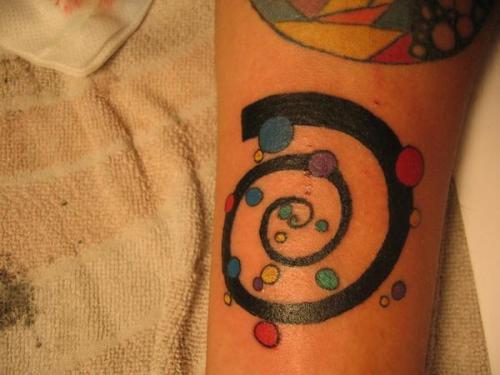 Photo de Big bang, rond, tatouage