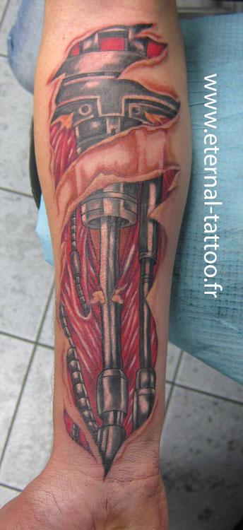 Photo de Biomécanique, biomécanique, metal réalisé par Eternal Tattoo