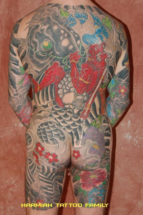 Photo de Carpe et démon - dos entier, démon, carpe réalisé par Haamiah Tattoo Family