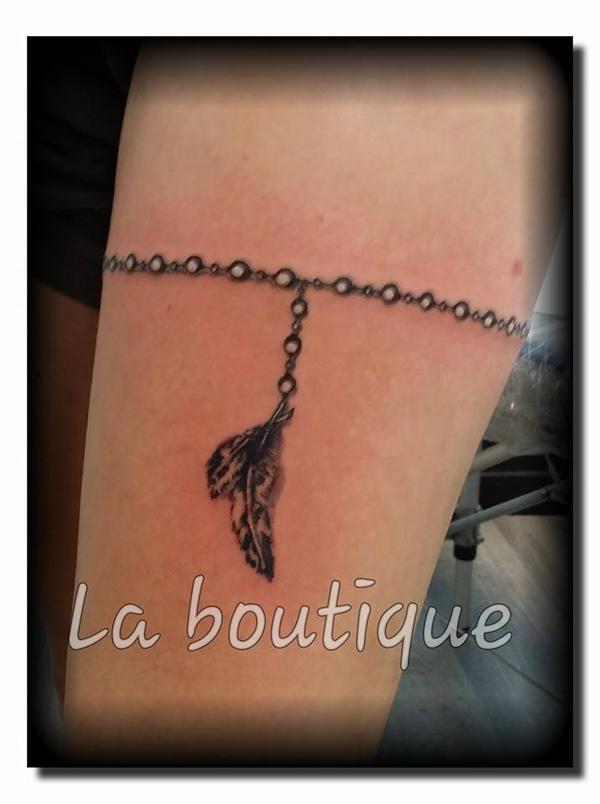 Chapelet et plume