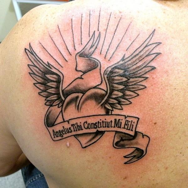 Photo de Coeur sacré, coeur, tatouage réalisé par Tattoo Passion
