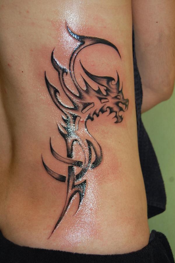 Photo de dragon stylé tribal, tribal, dragon réalisé par News Ink Tattoo