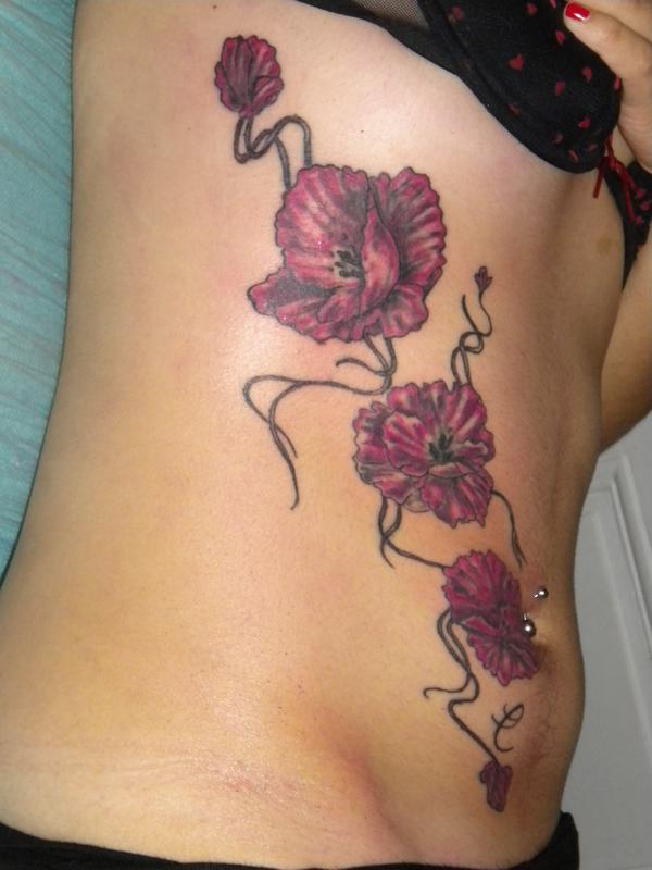Photo de fleur, fleurs, tatouage réalisé par Jeanjean Tatouage