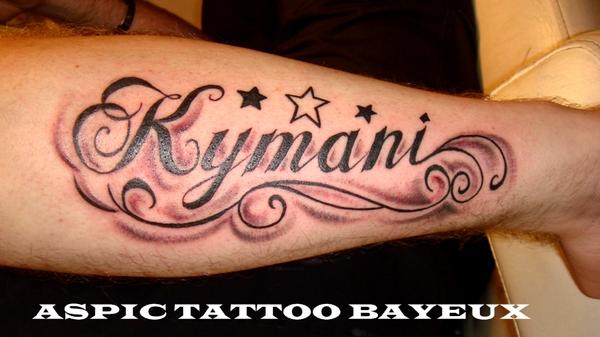 Photo de lettrage "Kymani", calligraphie, lettrage réalisé par Aspic  Tattoo