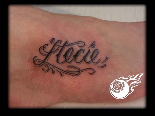 Photo de Lettrage sur pied, lettrage, pied réalisé par Florian Tattoo