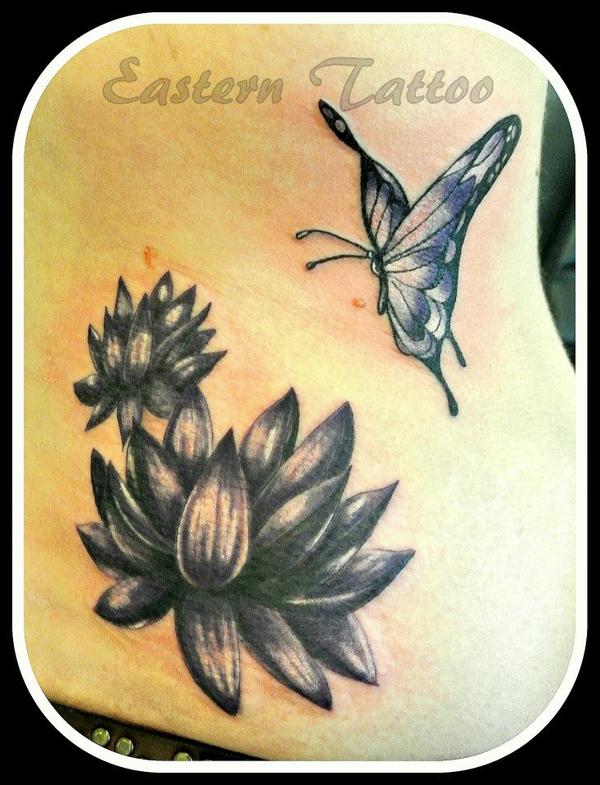Photo de Lotus et papillon, lotus, papillon réalisé par Eastern Tattoo