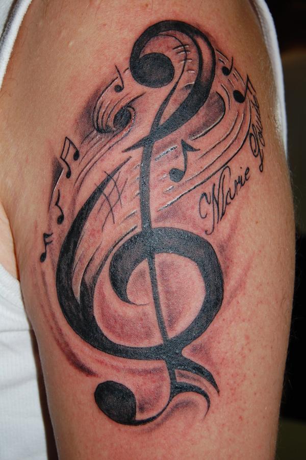 Photo de note de musique, tatouage, inclassable réalisé par News Ink Tattoo