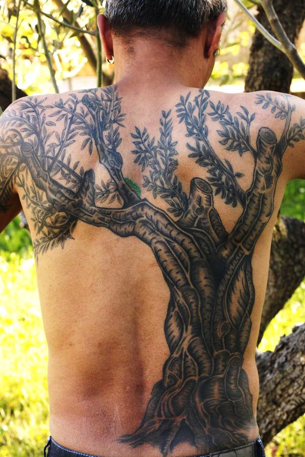 Photo de Olivier, fleurs, tatouage réalisé par Eastern Tattoo