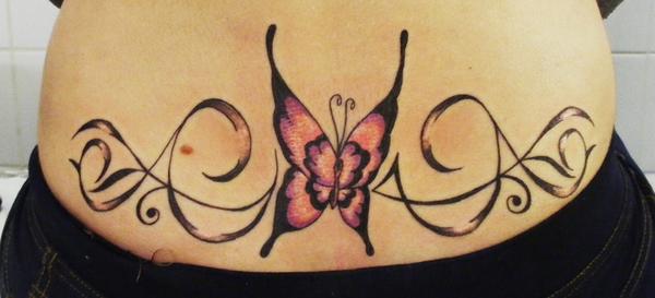 Photo de Papillon au bas du dos, tribal, papillon réalisé par Eastern Tattoo
