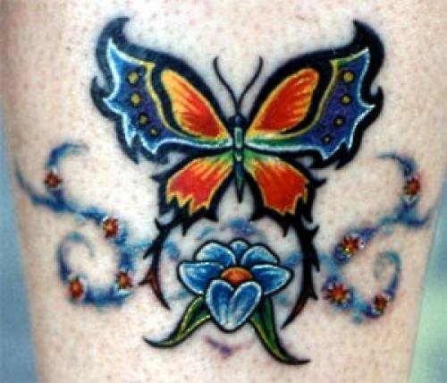Papillon fleur et tribal coloré