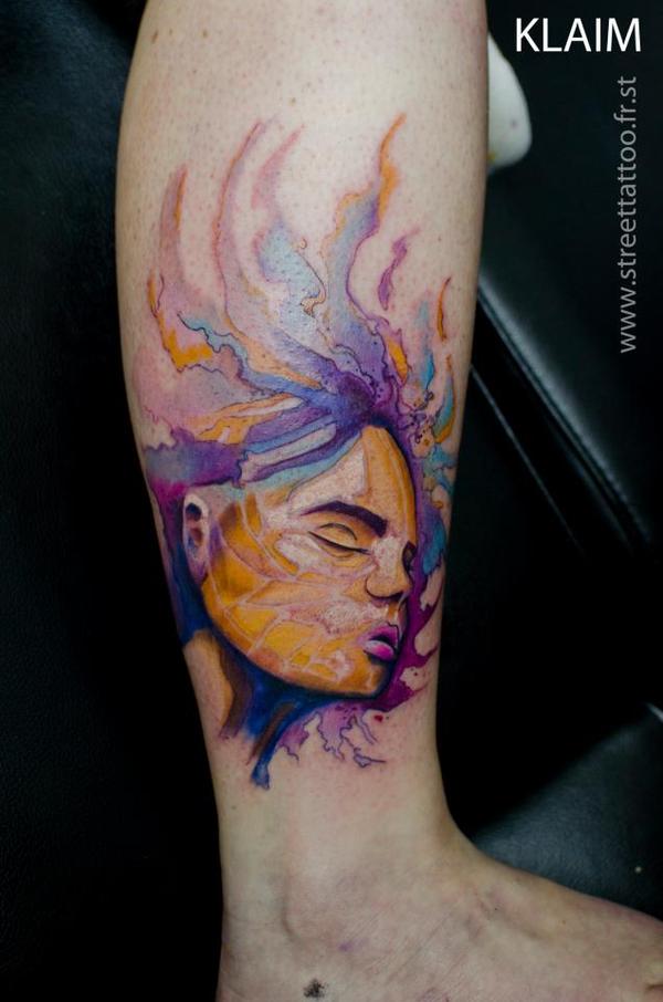 Photo de portrait aquarelle, tatouage, inclassable réalisé par Street Tattoo