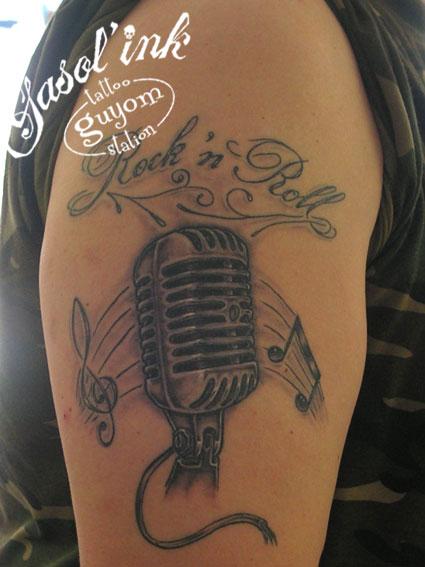 Photo de rn'r 004, tatouage, rok n' roll réalisé par gasol'ink / guyom tattoo station