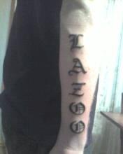 Photo de Surnom, écriture, tatouage