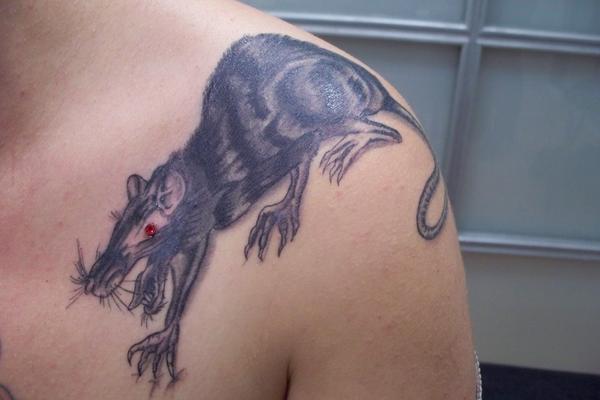 Tatouage réalisé par Stigma