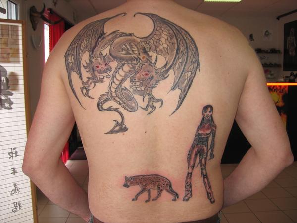 Photo de Tatouage Dragon, guerrière et hyène, dragon, guerrier réalisé par Eternal Tattoo