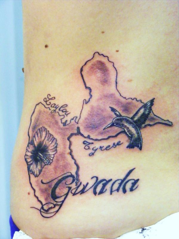 Photo de Tatouage Guadeloupe, fleurs, tatouage réalisé par Eastern Tattoo