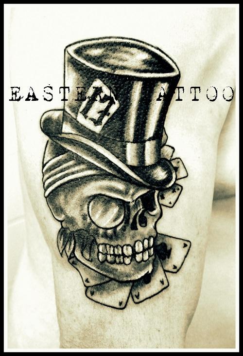 Photo de tatouage skull, tête de mort, skull réalisé par Eastern Tattoo