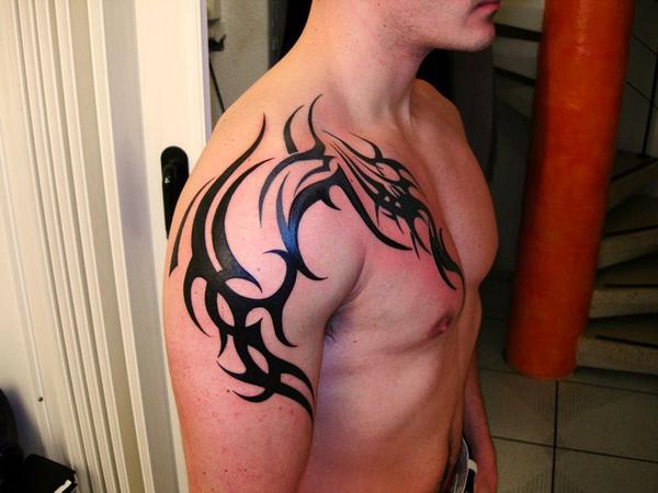 Photo de Tribal, tribal, tattoo réalisé par Needles Hand Tattoo