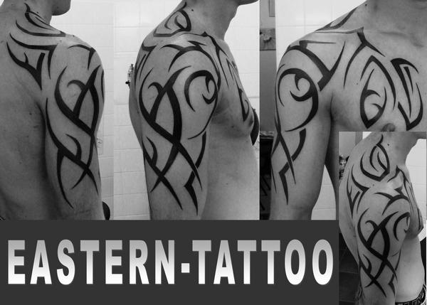 Photo de tribal bras, tribal, tatouage réalisé par Eastern Tattoo